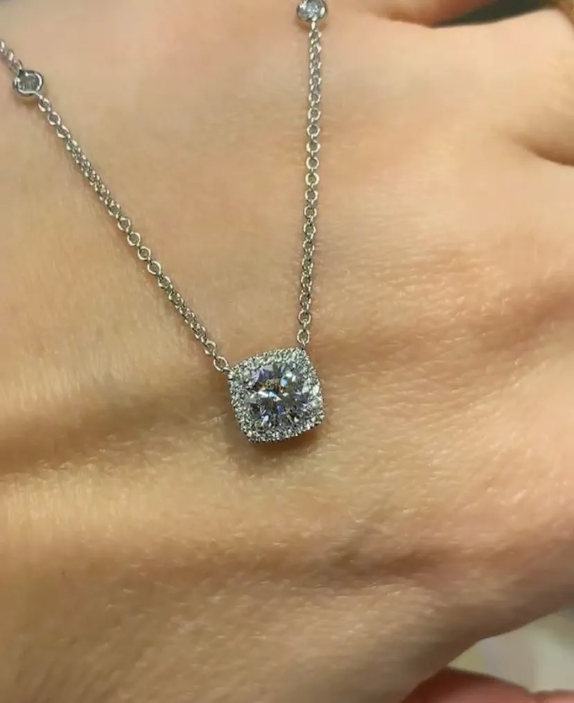 0.81CT T.W. Diamond Round Brilliant Cut Halo Solitaire Necklace