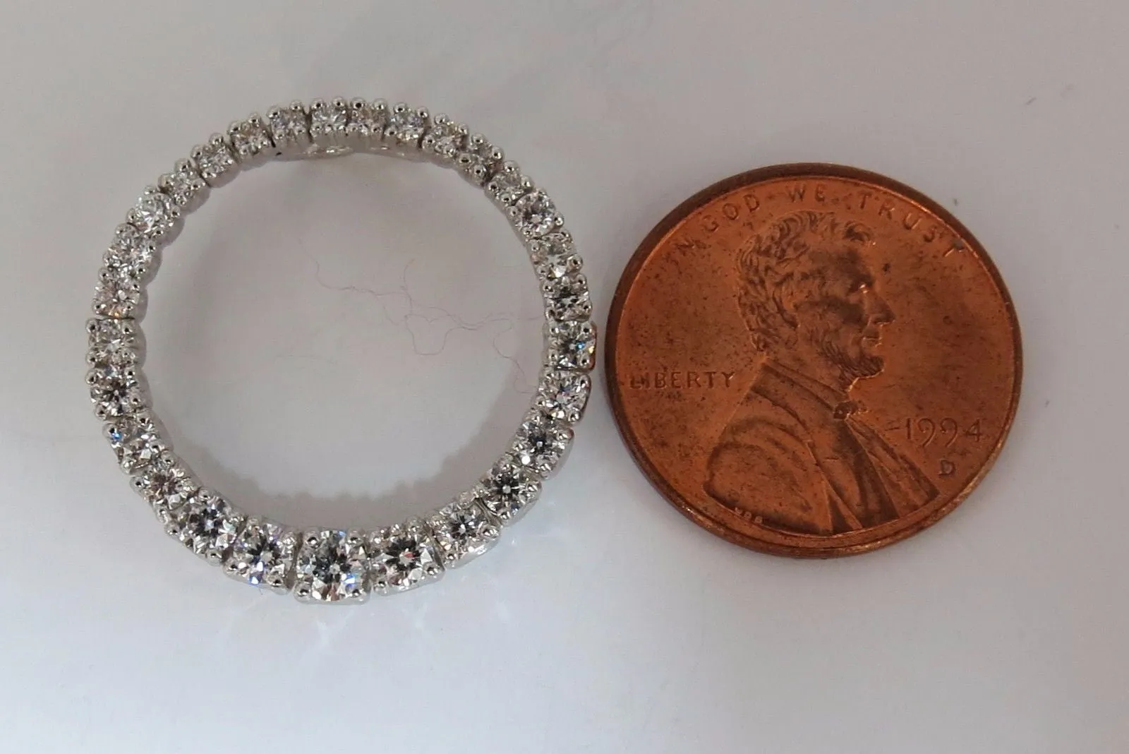 1.07ct. DIAMONDS GRADUATED CIRCLE DIAMOND PENDANT 14KT G/VS