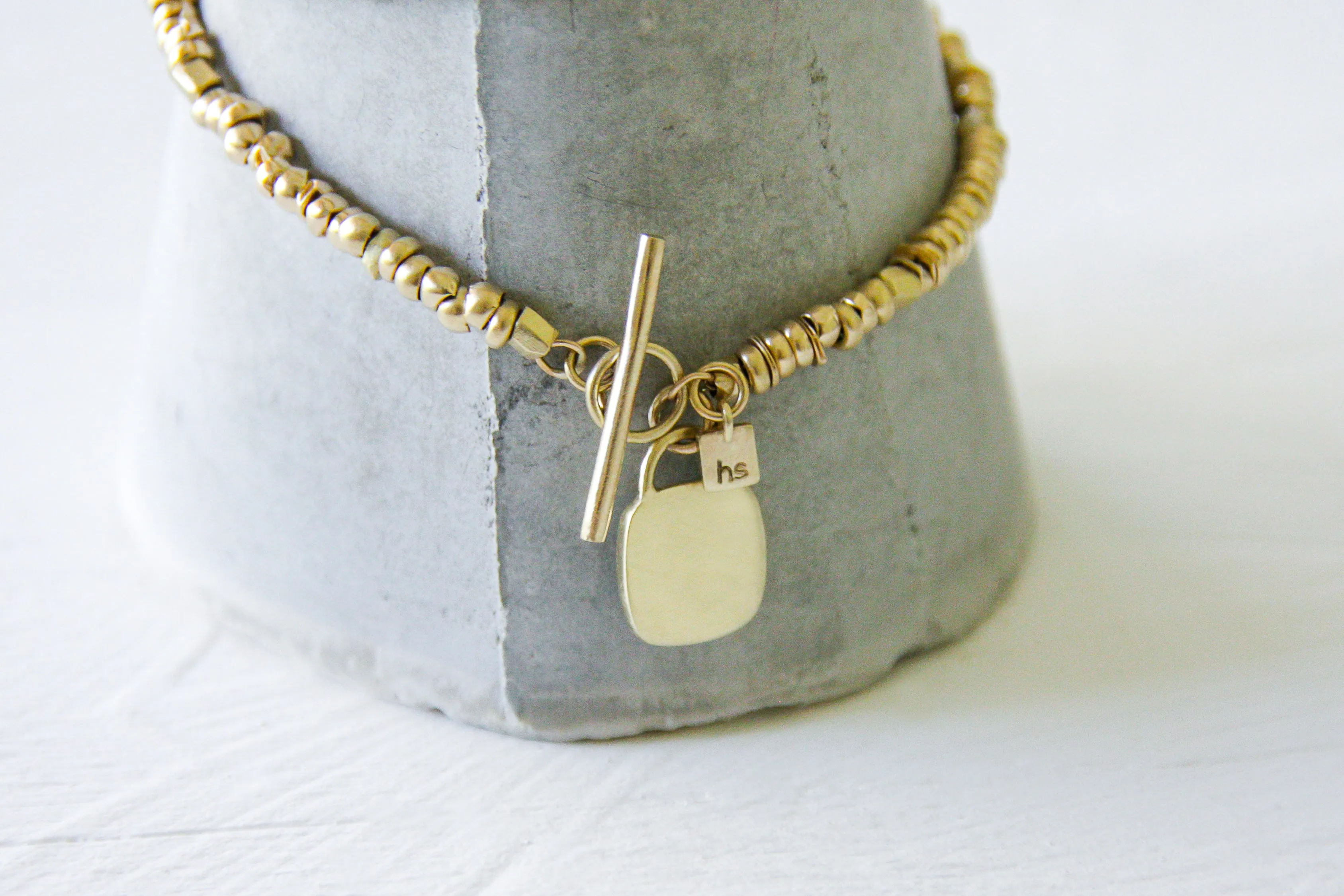 14K Solid Gold beads necklace with a gold & concrete charm