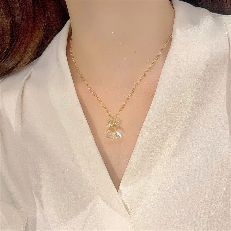 Bow and Bell Necklace