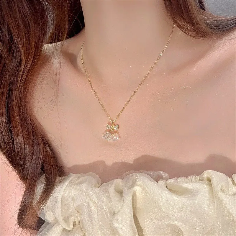 Bow and Bell Necklace