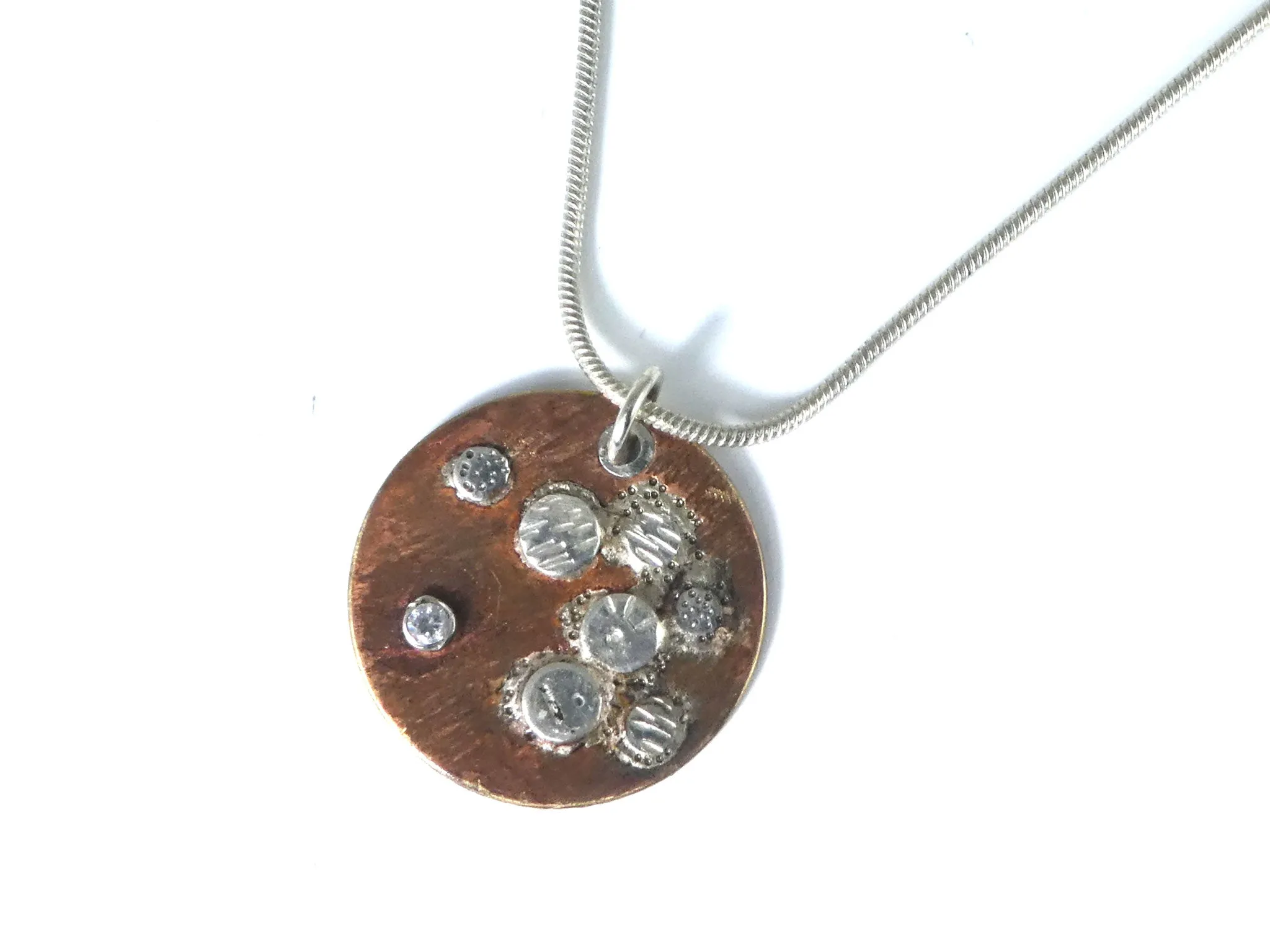 Bronze and Silver Disk Textured Necklace "From the Earth"
