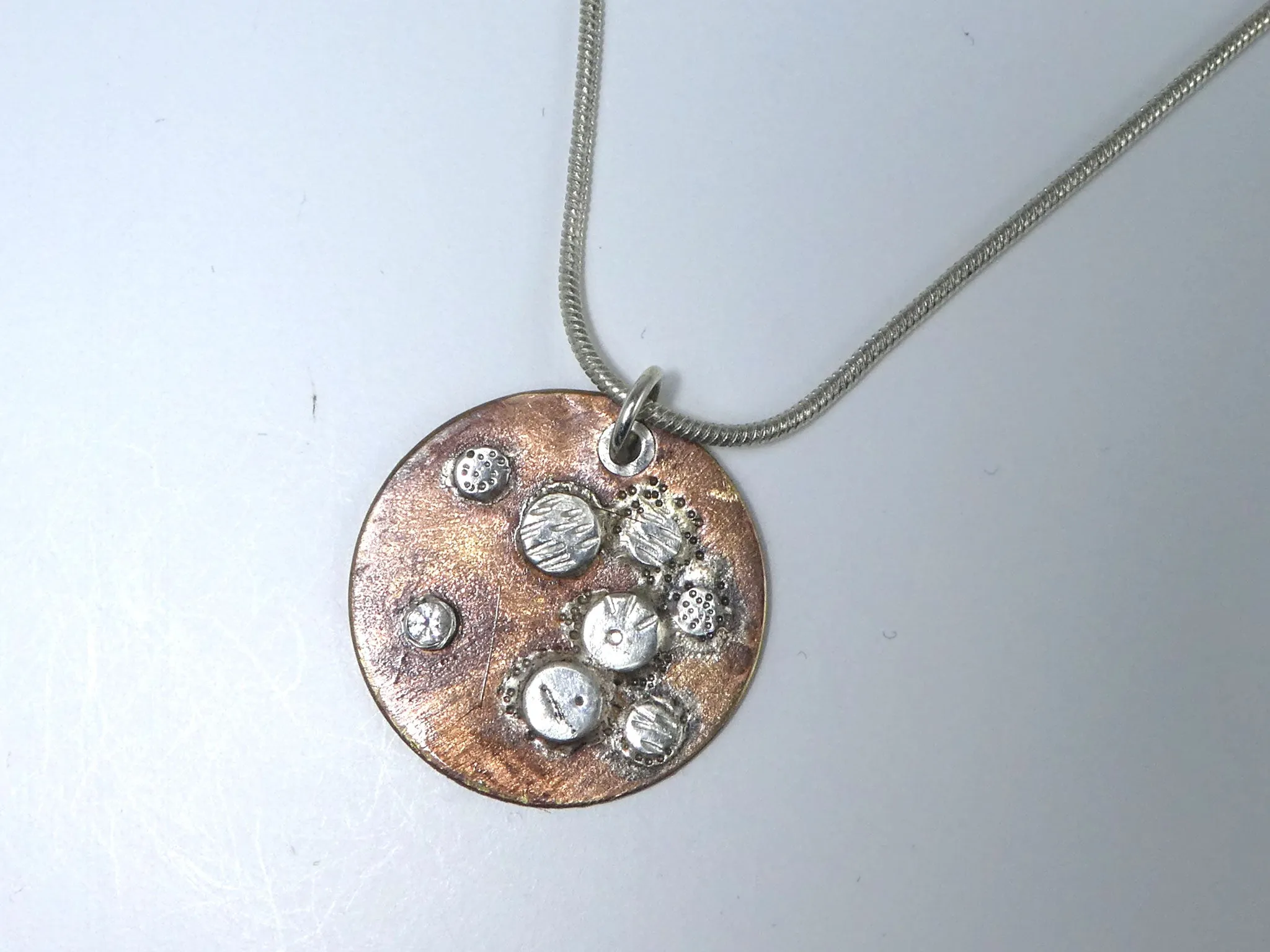 Bronze and Silver Disk Textured Necklace "From the Earth"