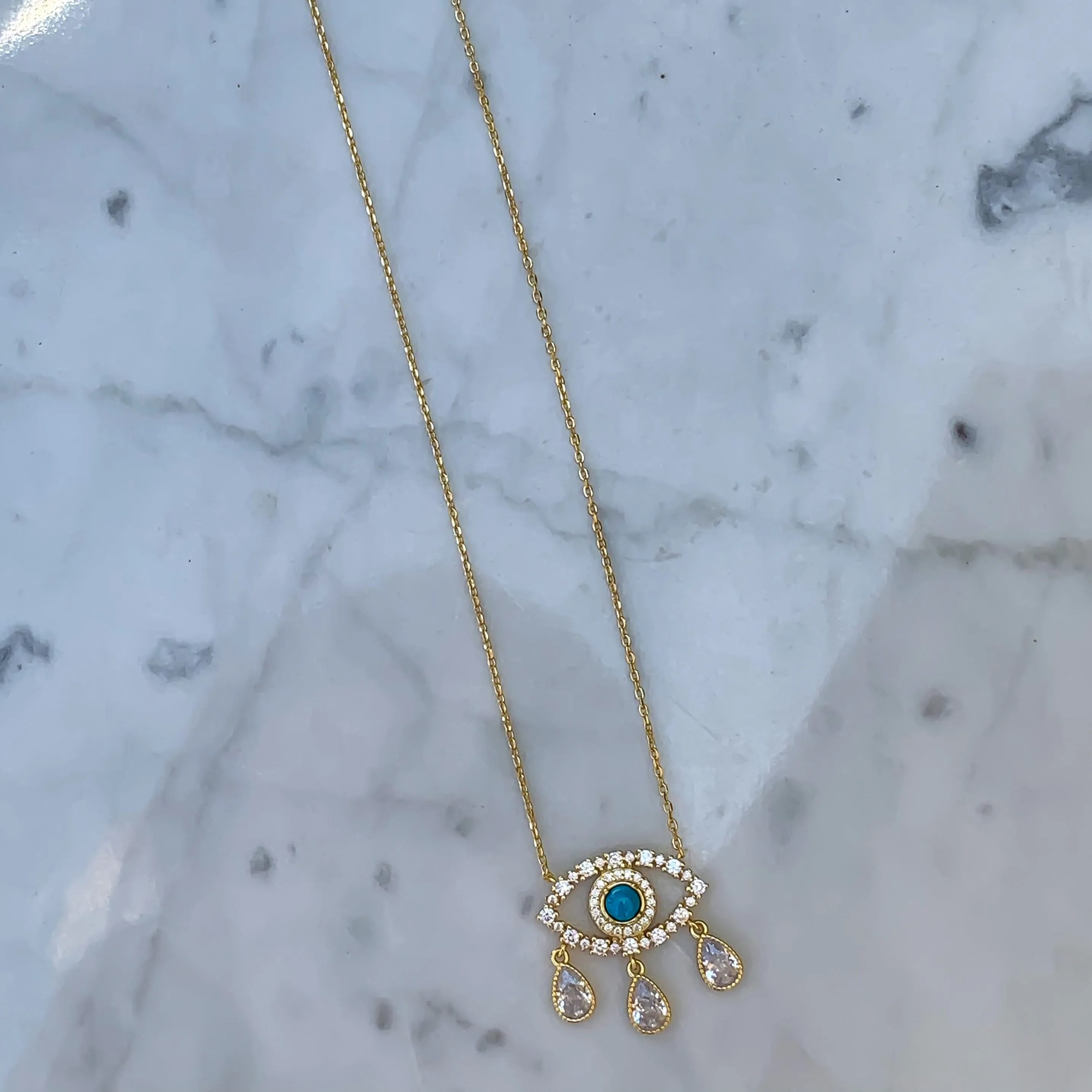 “Diamond Tears" Gold plated turquoise eye necklace