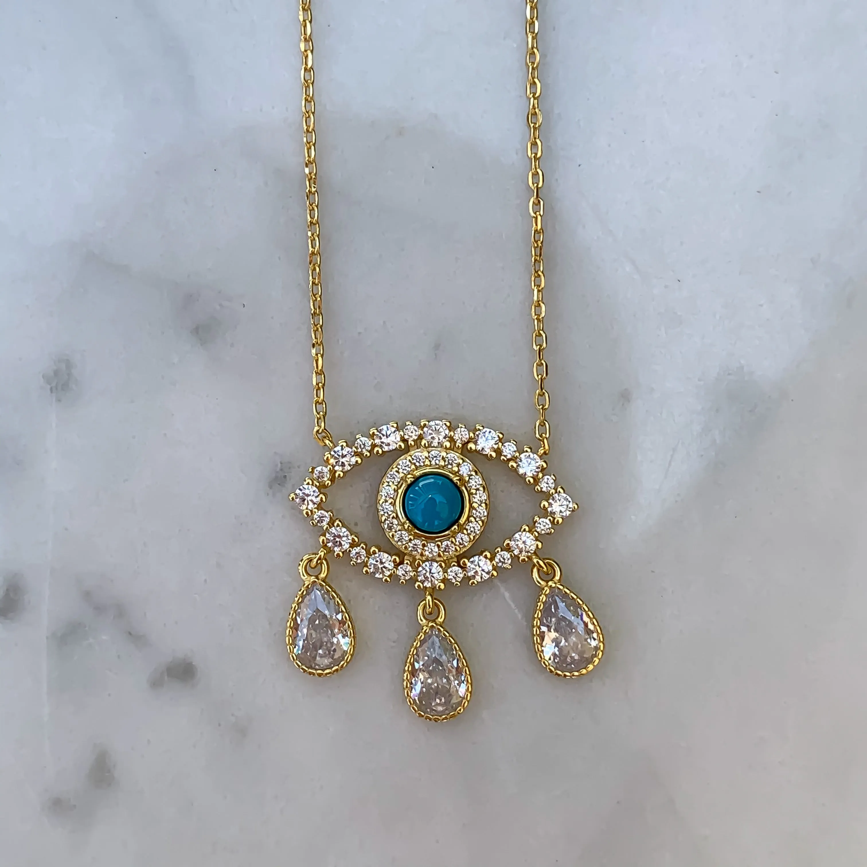 “Diamond Tears" Gold plated turquoise eye necklace
