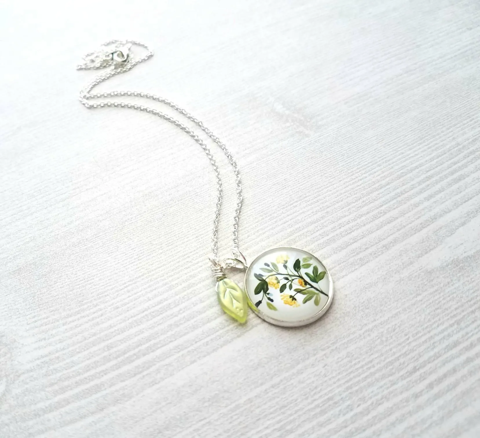 Flower Necklace, yellow flower pendant, floral necklace, plant necklace, light green leaf charm, delicate silver chain, little flowers round