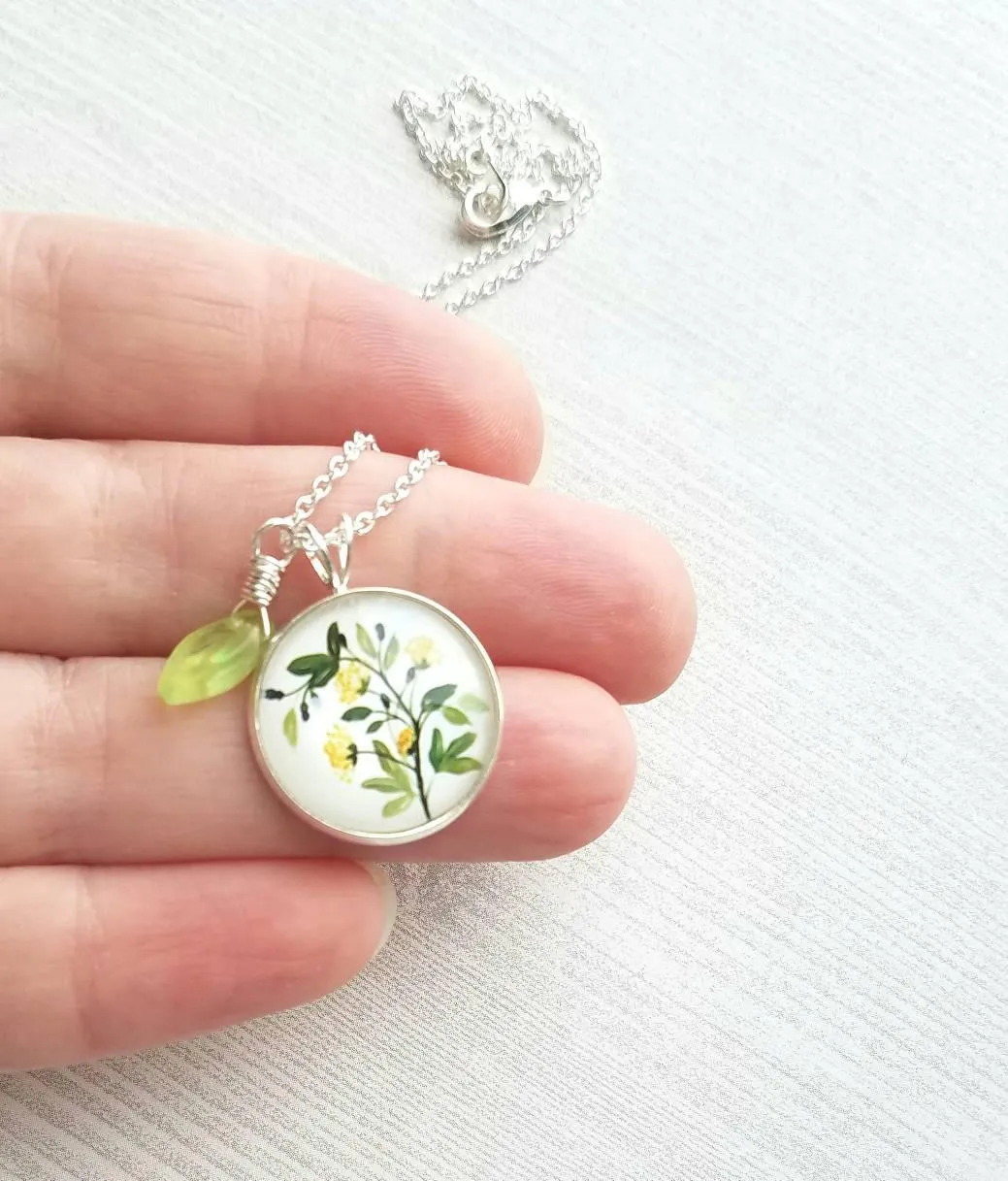 Flower Necklace, yellow flower pendant, floral necklace, plant necklace, light green leaf charm, delicate silver chain, little flowers round