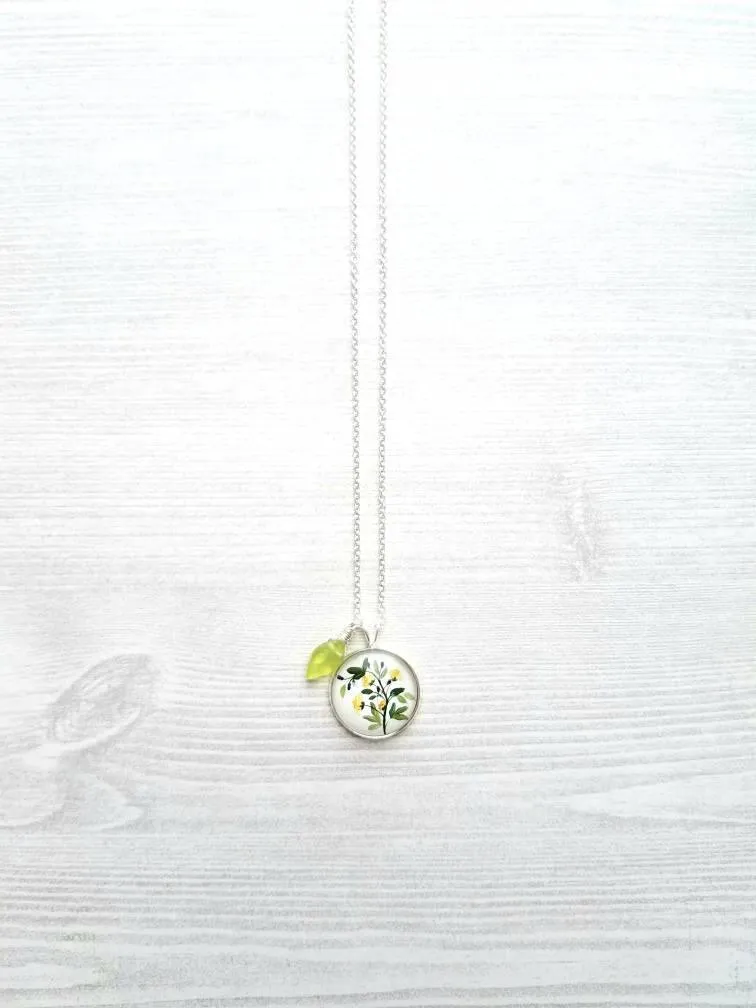 Flower Necklace, yellow flower pendant, floral necklace, plant necklace, light green leaf charm, delicate silver chain, little flowers round