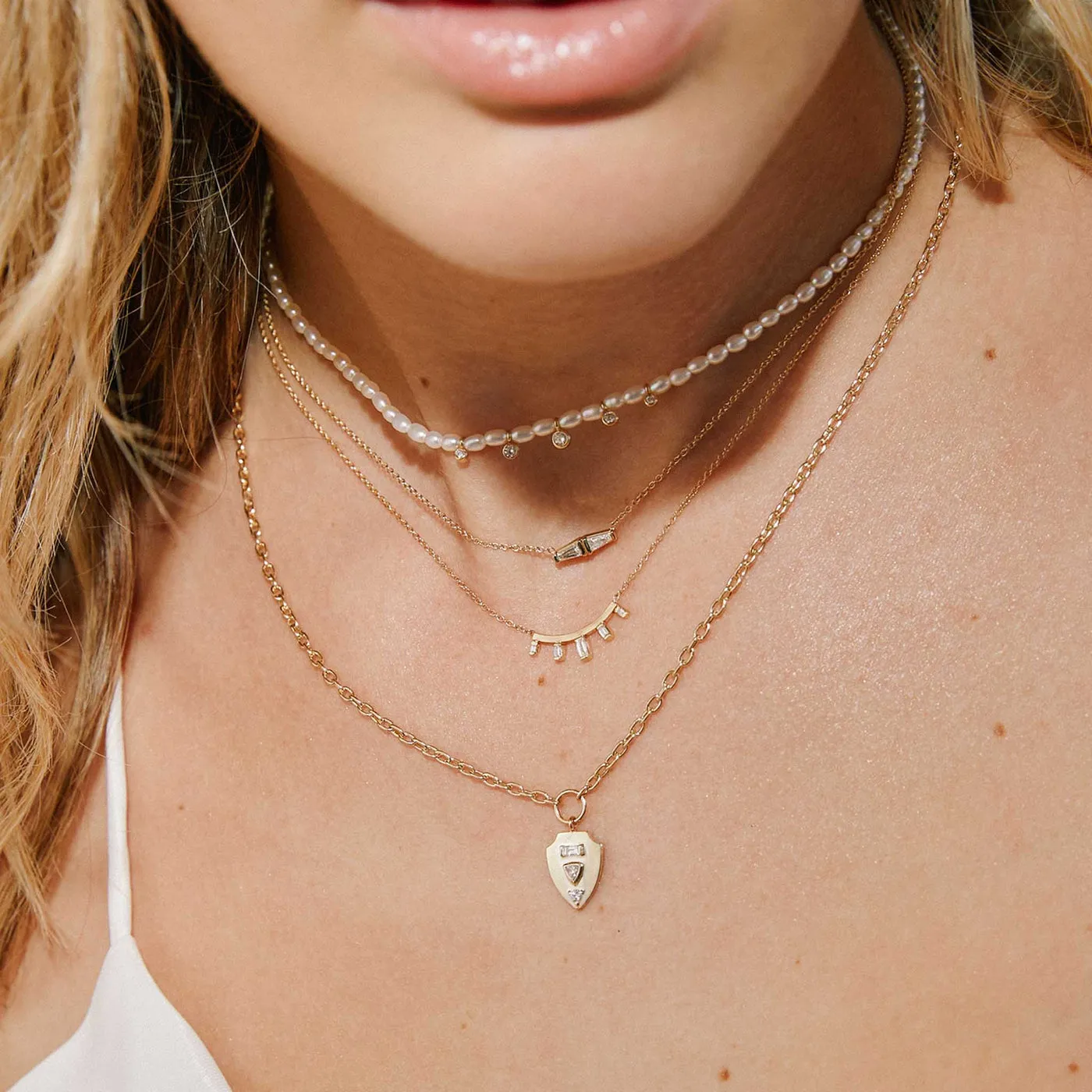 Graduated Baguette Diamond Curved Bar Necklace