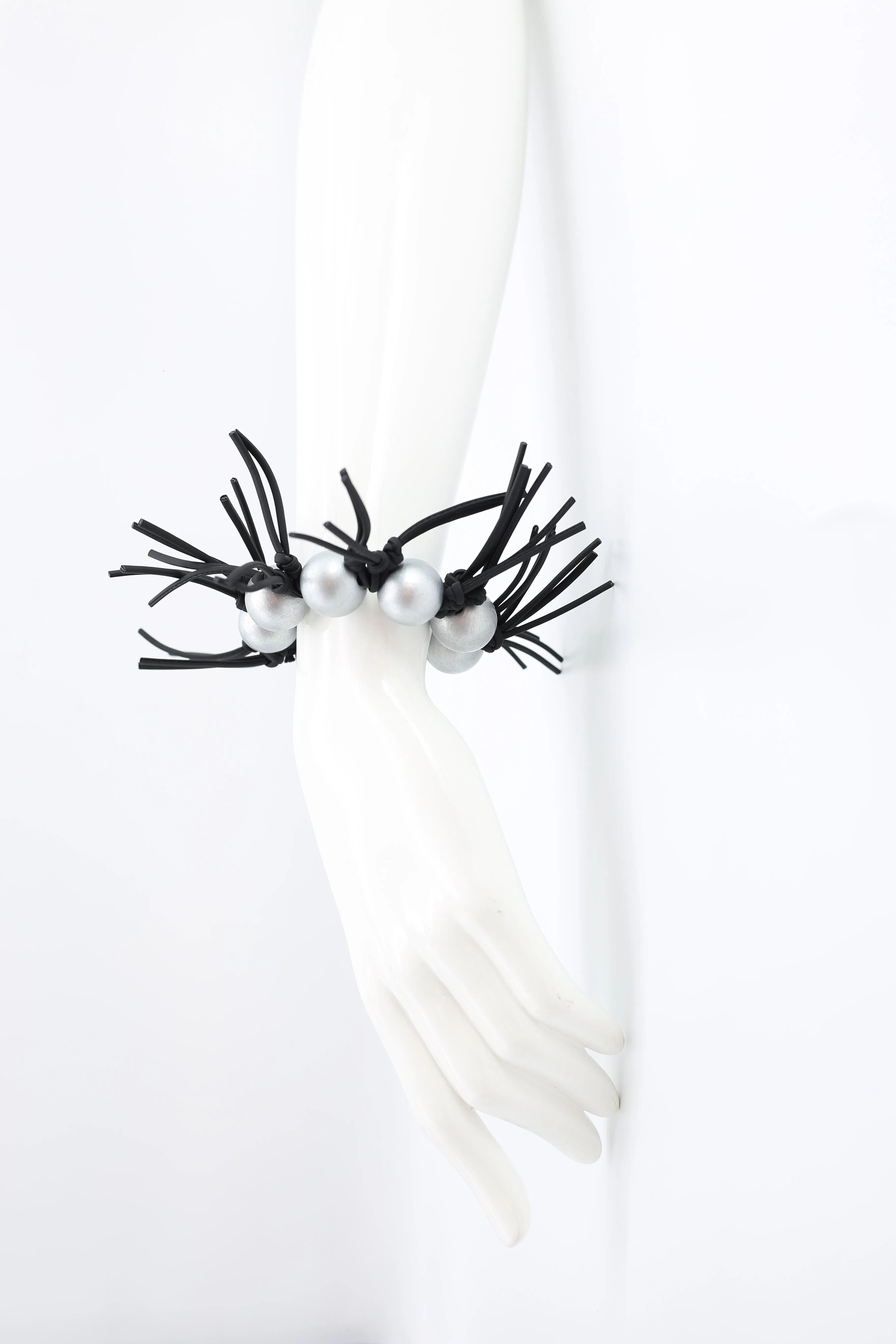 Round Beads and Leatherette Spikes Bracelet