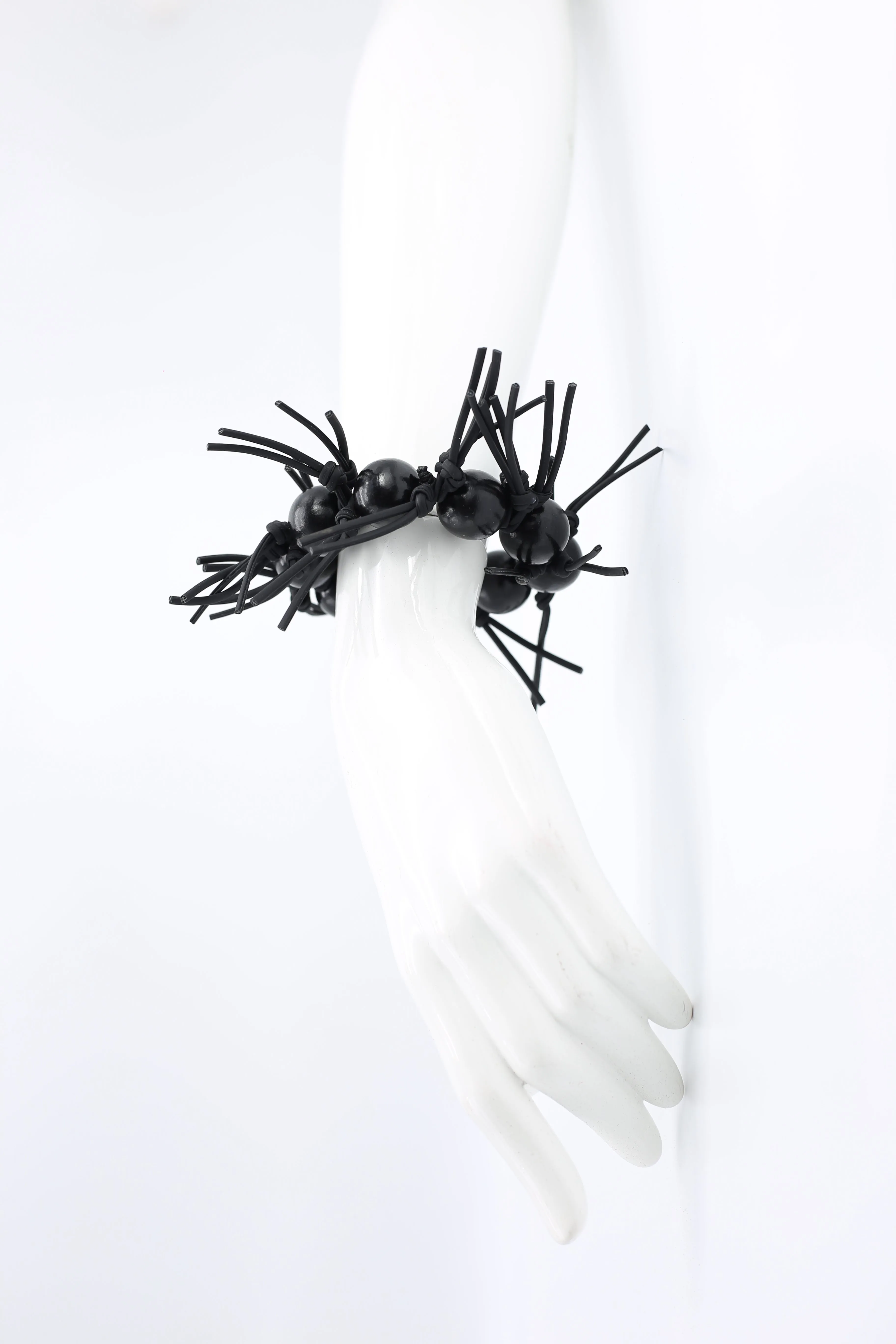 Round Beads and Leatherette Spikes Bracelet