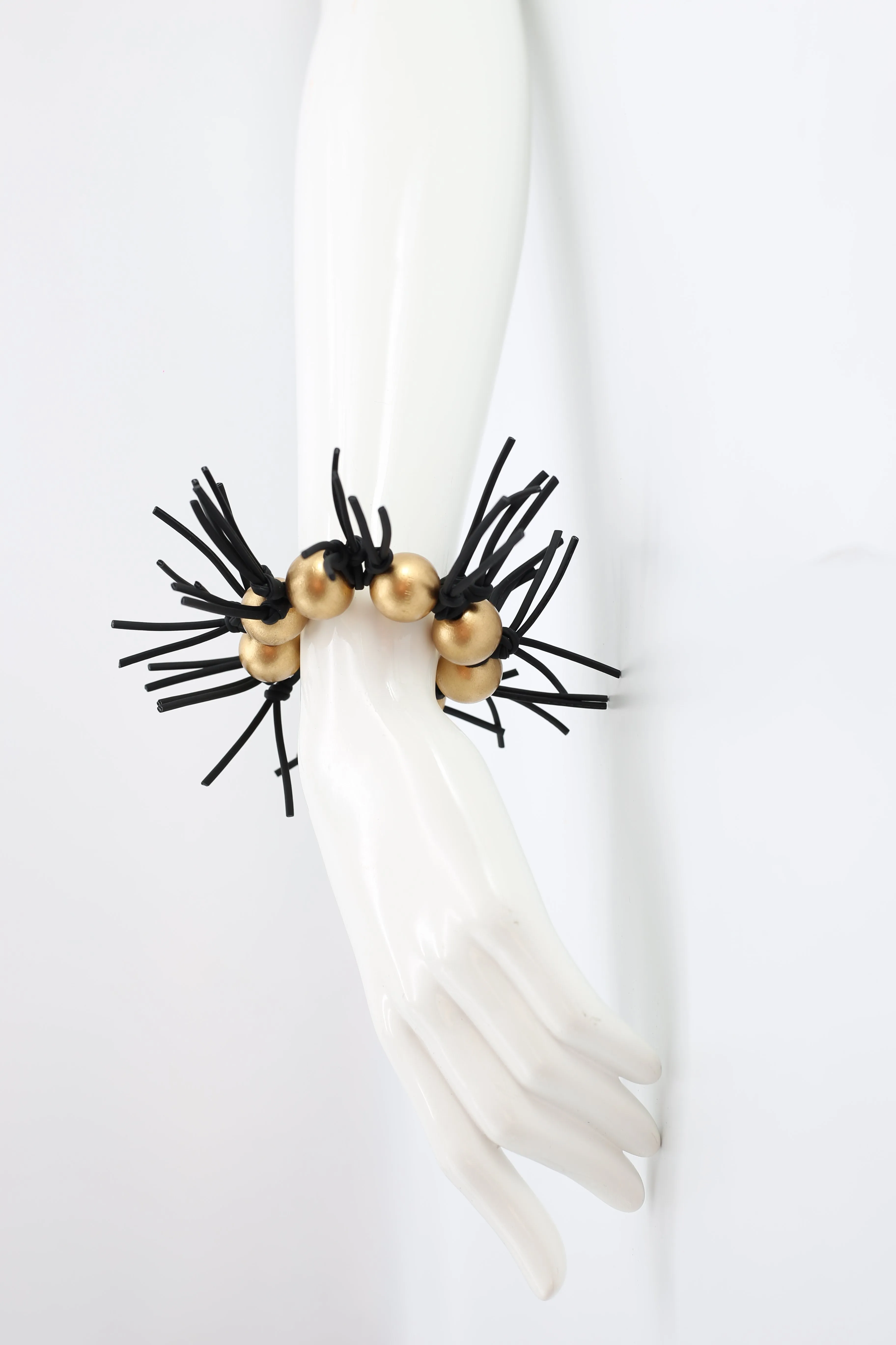 Round Beads and Leatherette Spikes Bracelet