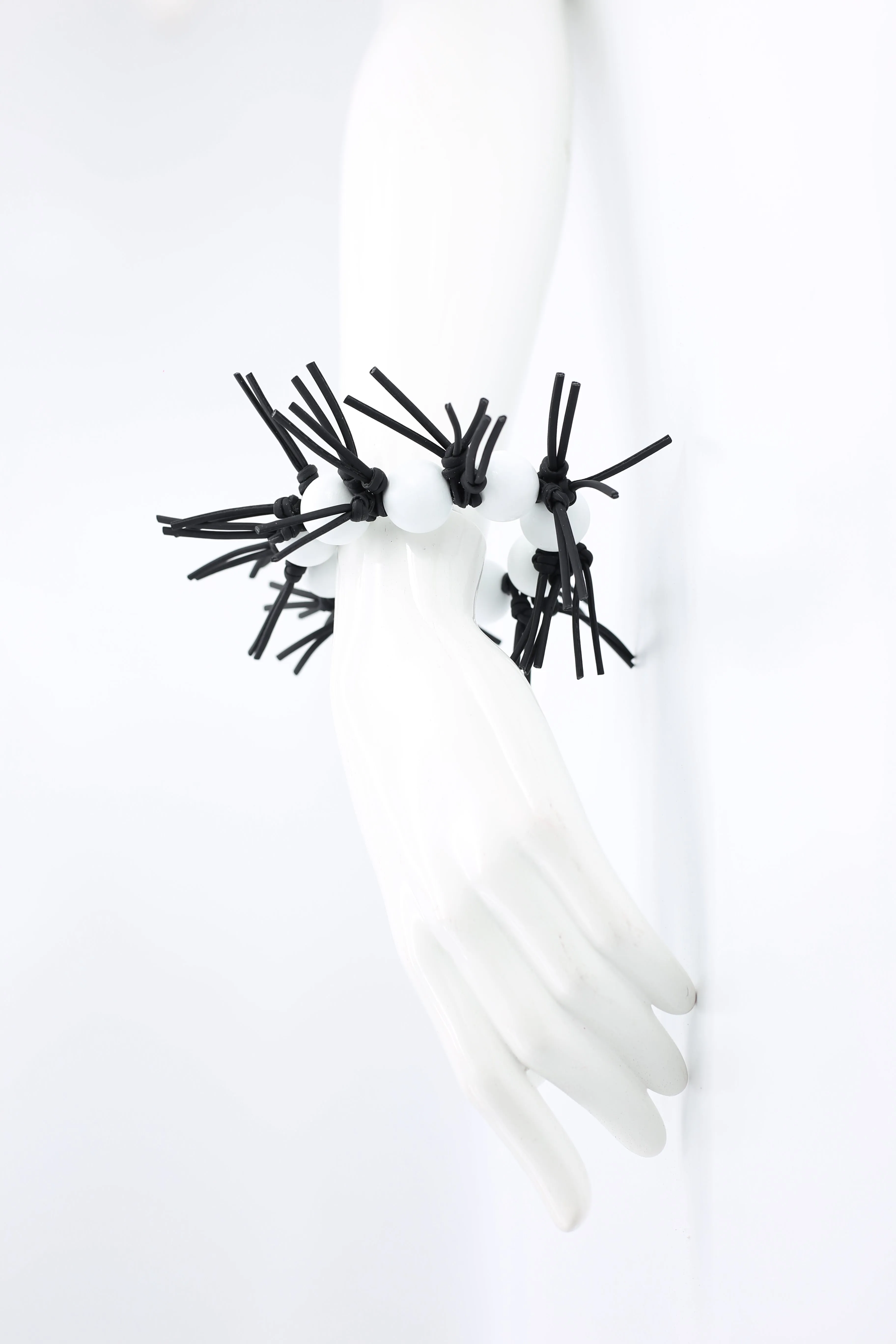 Round Beads and Leatherette Spikes Bracelet