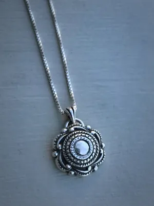 Swirling Charm Necklace